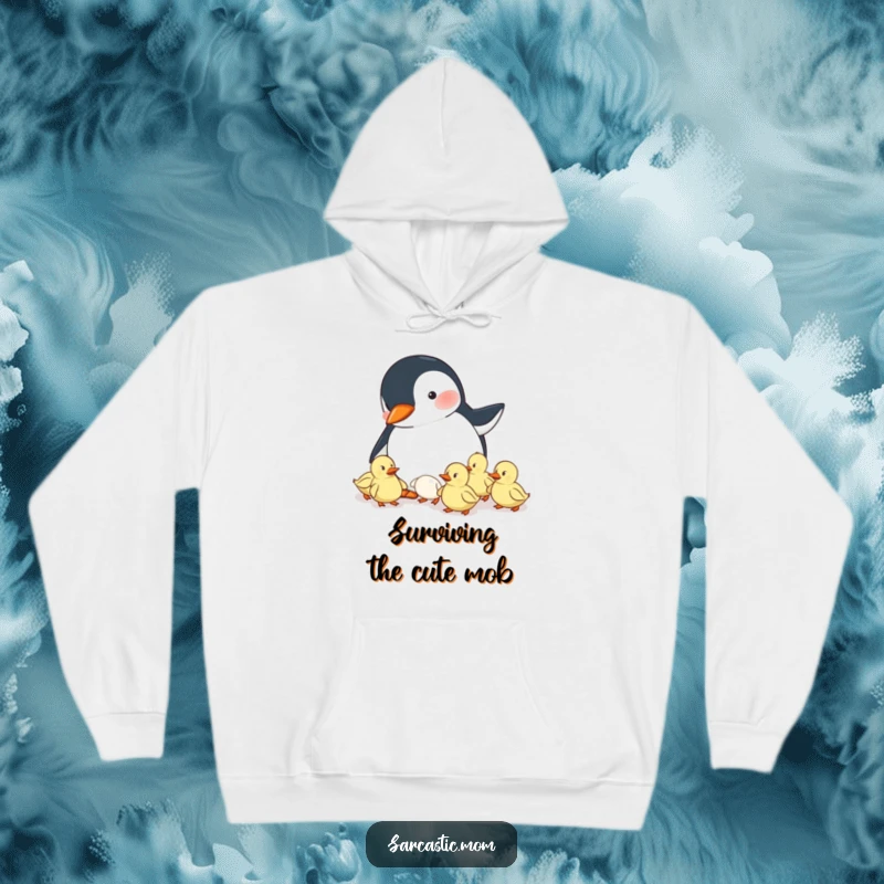 Funny hoodie with a penguin mom trying to herd ducklings, offering warmth and humorous comfort for every mom.