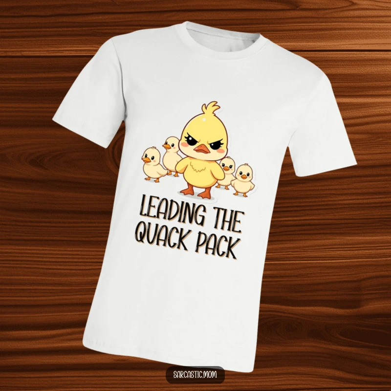 Funny determined mother duck character frowning while leading a chaotic line of ducklings on this humorous t-shirt.
